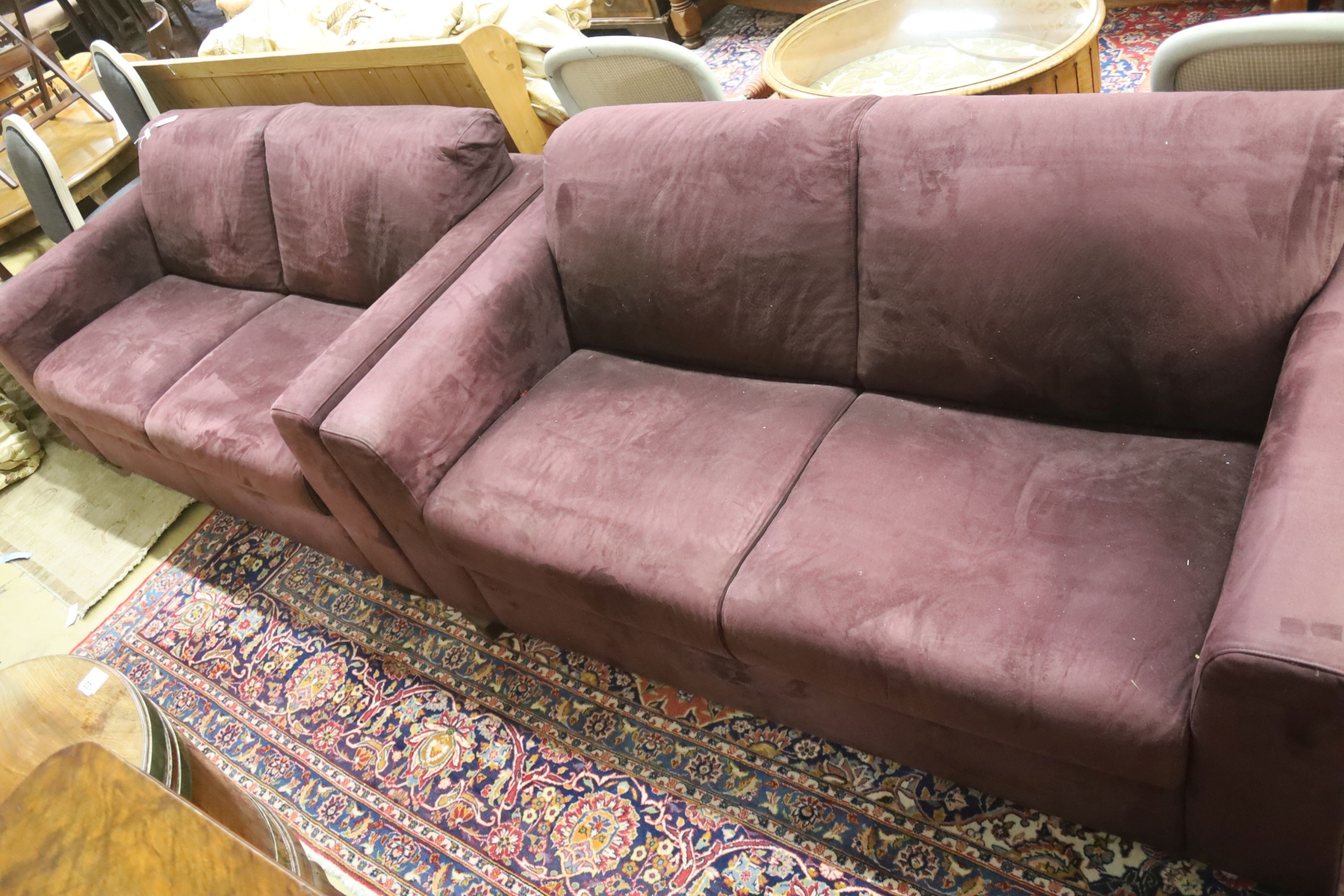 A pair of contemporary mauve fabric two seater settees, length 174cm, depth 94cm, height 80cm
